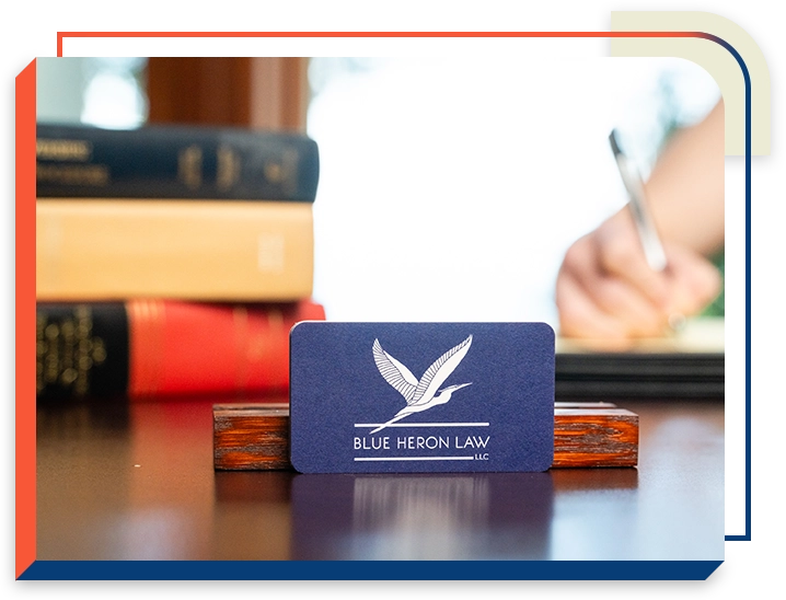 5 A desk with a pen and a card on it